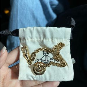 vivienne westwood bracelet with orb in gold